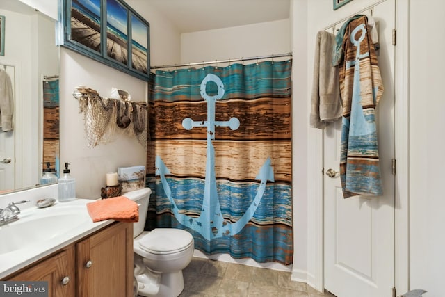 bathroom with walk in shower, vanity, and toilet