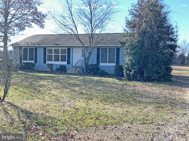 ranch-style house with a front yard