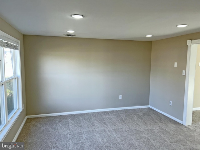 view of carpeted spare room