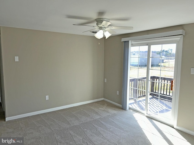 unfurnished room with light carpet and ceiling fan