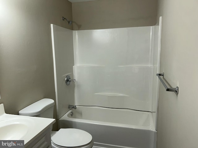 full bathroom with vanity, shower / bathing tub combination, and toilet