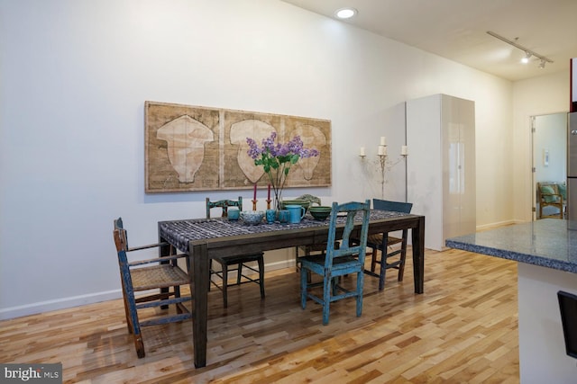 1215 N Hancock St, Philadelphia, PA 19122 - dining space featuring track lighting and wood-type flooring