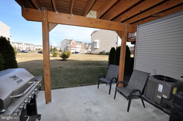 view of patio with central AC and grilling area