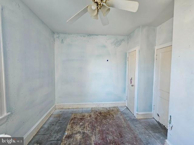 unfurnished room featuring ceiling fan