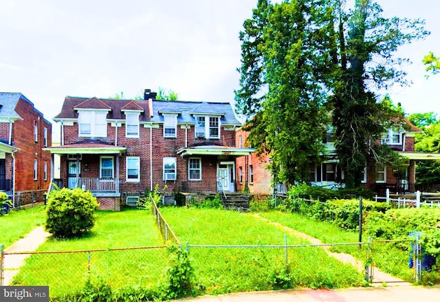 view of front of property with a porch and a front yard