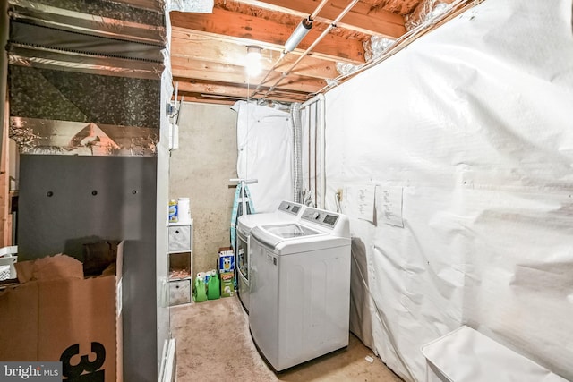 laundry room with washer and dryer