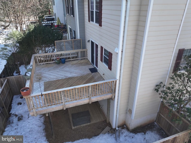 view of snow covered deck