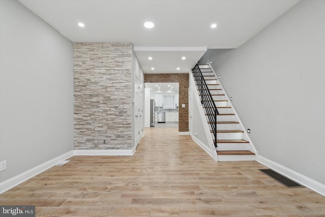 foyer with light hardwood / wood-style flooring