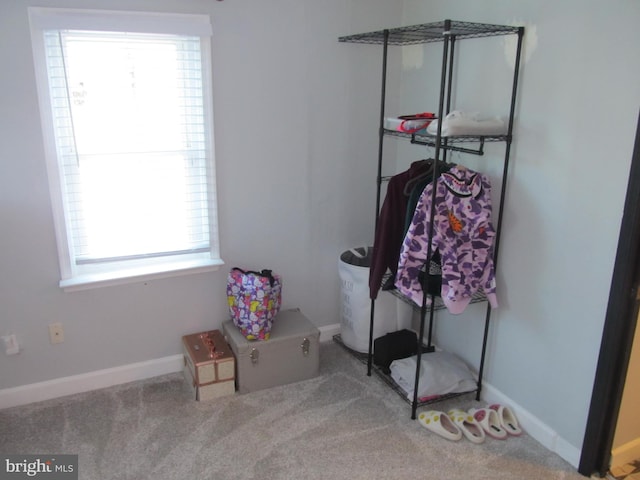 348 Broad St, Mount Holly, NJ 08060 - interior space with multiple windows, carpet floors, and baseboards