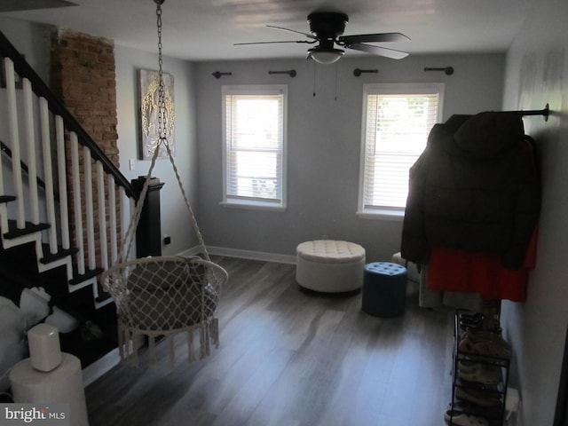348 Broad St, Mount Holly, NJ 08060 - sitting room featuring plenty of natural light, wood finished floors, ceiling fan, and stairway