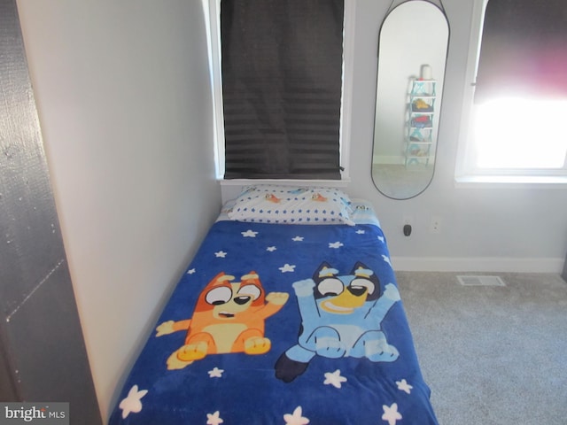 348 Broad St, Mount Holly, NJ 08060 - carpeted bedroom featuring baseboards