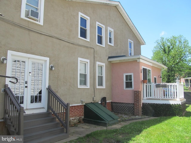 348 Broad St, Mount Holly, NJ 08060 - back of property with french doors and stucco siding
