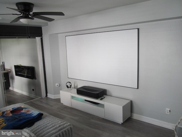 348 Broad St, Mount Holly, NJ 08060 - cinema room with a ceiling fan, dark wood-type flooring, and baseboards
