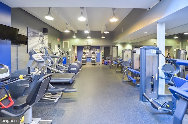 workout area with track lighting