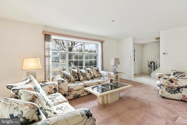 living room featuring light colored carpet