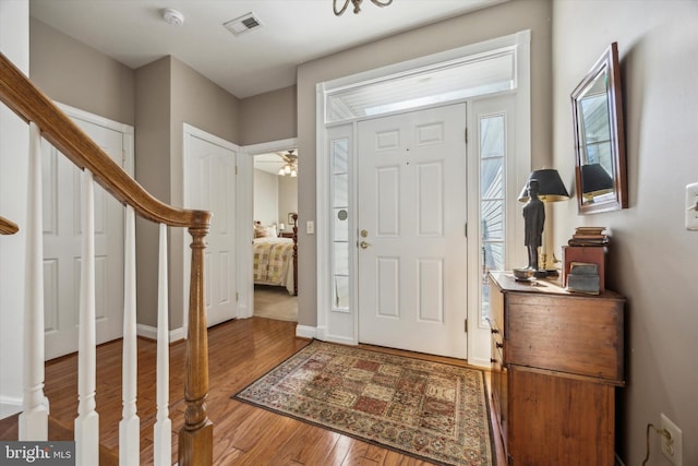 foyer with hardwood / wood-style flooring