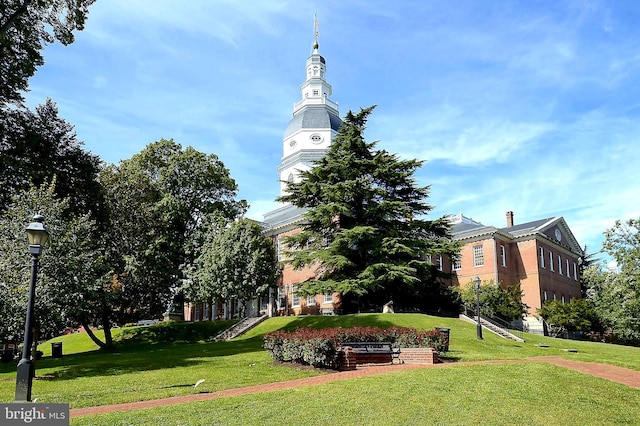 view of community featuring a lawn