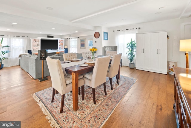 dining area with light hardwood / wood-style flooring