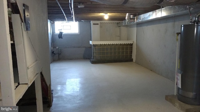 basement featuring water heater