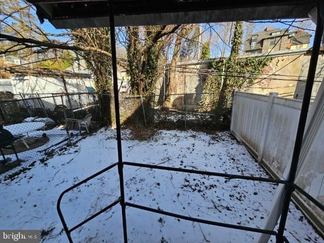 view of snowy yard