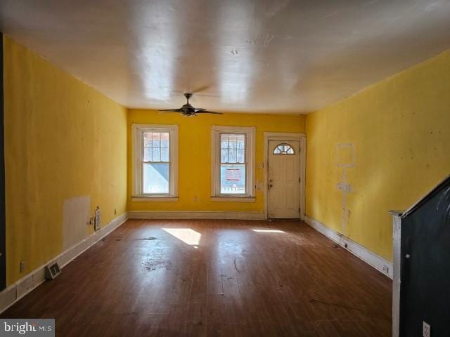 foyer featuring dark hardwood / wood-style floors and ceiling fan