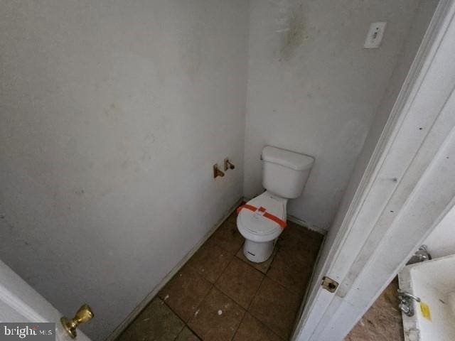 bathroom featuring toilet