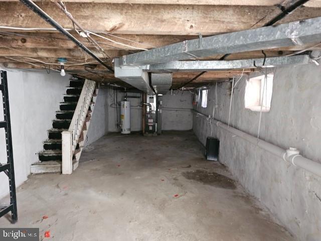 basement with heating unit and gas water heater