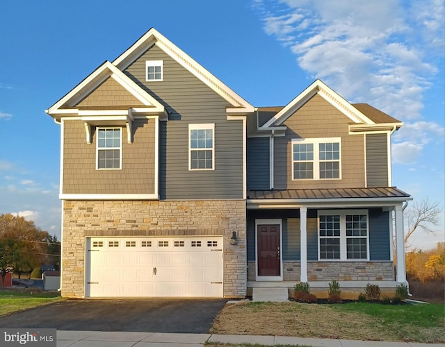 craftsman-style house featuring a garage