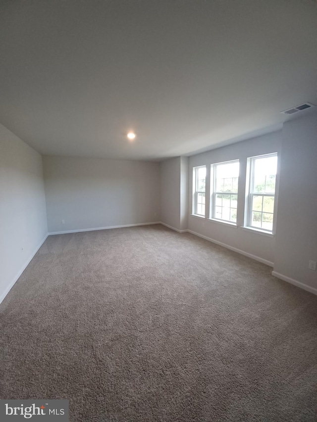 empty room with carpet floors