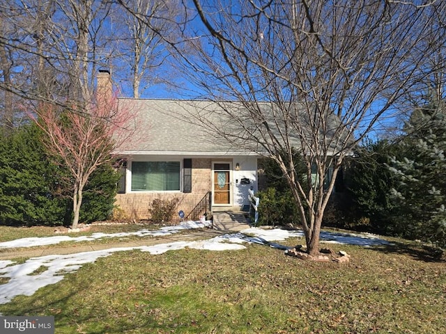 view of front of house with a front yard