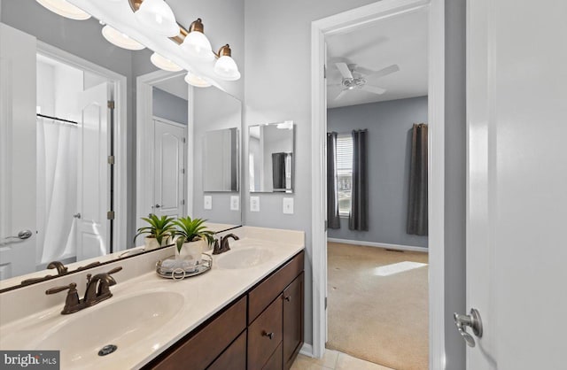 bathroom with vanity and ceiling fan