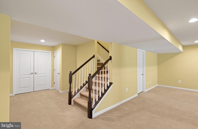 stairway with carpet flooring