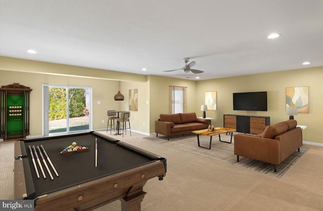 game room with light carpet, billiards, and ceiling fan