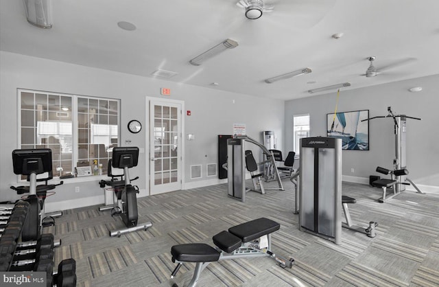 gym featuring carpet flooring, ceiling fan, and french doors