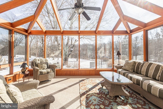 sunroom featuring ceiling fan