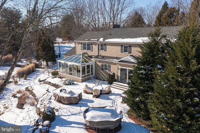 view of snow covered property