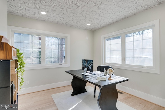 office featuring light hardwood / wood-style floors