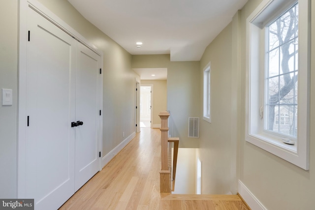 hallway featuring light wood-type flooring