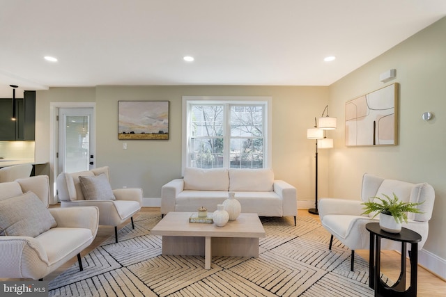 living room with light hardwood / wood-style floors