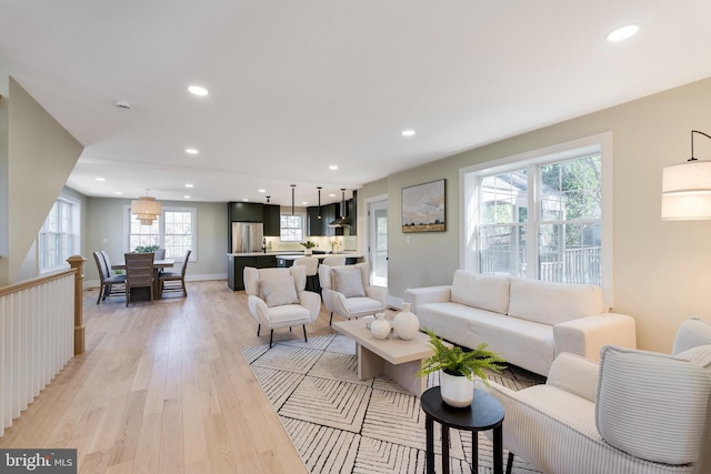 living room featuring light wood-type flooring