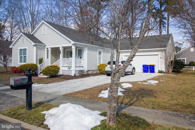 view of front of home with a garage and a porch