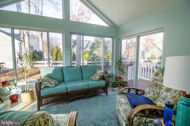 sunroom with lofted ceiling
