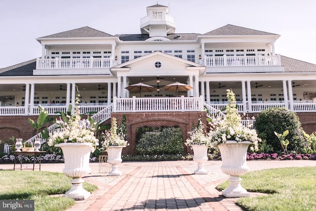 back of house featuring a patio and a balcony