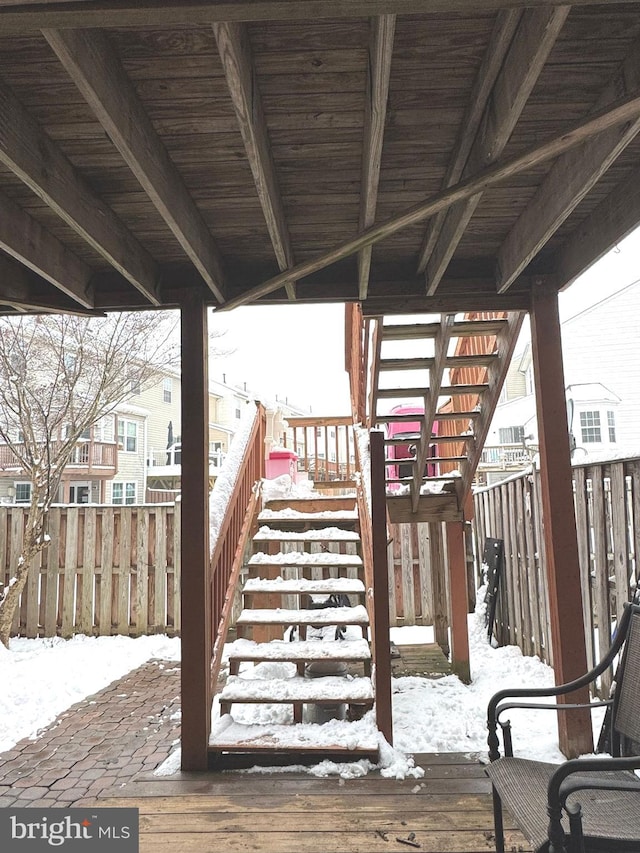 view of snow covered deck