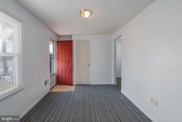 view of carpeted entryway