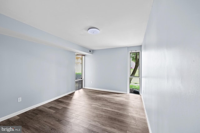 7153 Donnell Pl Unit A, District Heights, MD 20747 - spare room with dark wood-type flooring and baseboards