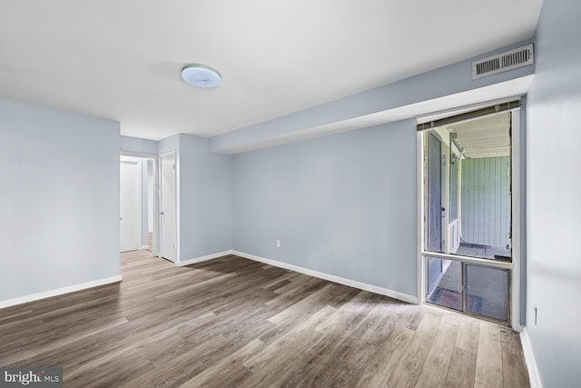 7153 Donnell Pl Unit A, District Heights, MD 20747 - spare room featuring wood finished floors and baseboards