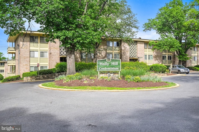 7153 Donnell Pl Unit A, District Heights, MD 20747 - view of building exterior featuring uncovered parking