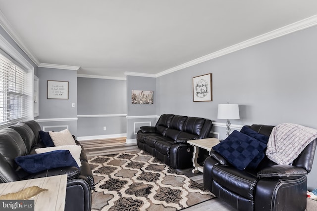 living room featuring ornamental molding and wood-type flooring