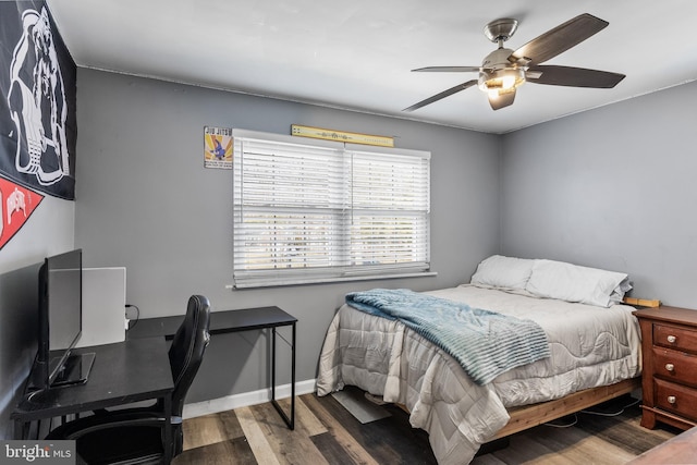 bedroom featuring ceiling fan and wood-type flooring